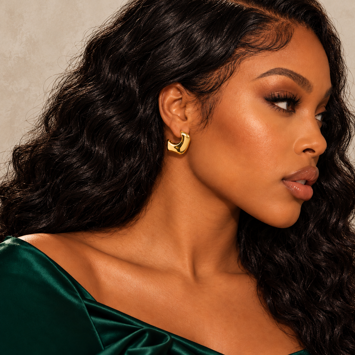 Time & Candy earrings styled with emerald green and warm neutral tones