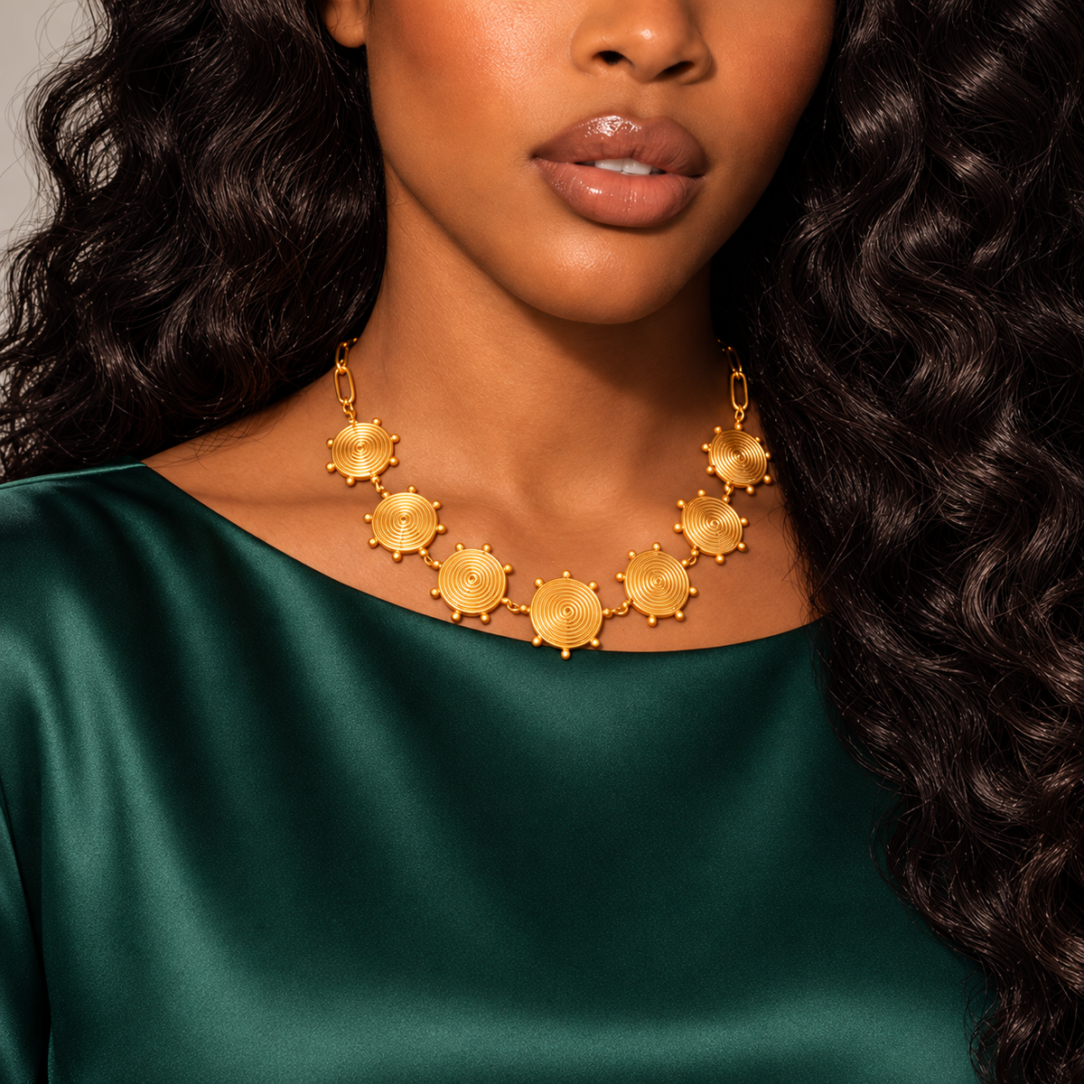 Time & Candy necklace styled with emerald green and warm neutral tones